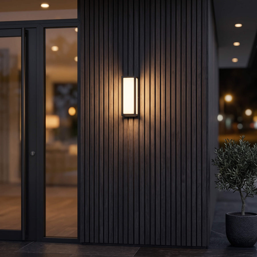 Close view of the black frame and opal diffuser on the Sentry motion sensor wall light