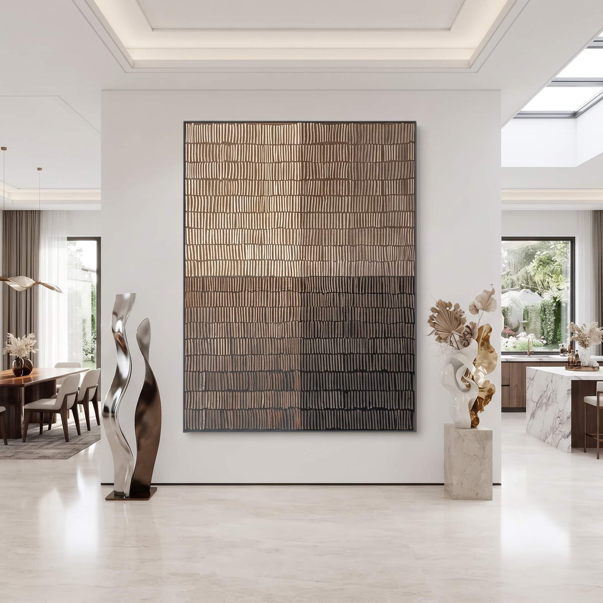 A large rectangular wall art piece with a textured, vertically ribbed surface in warm brown, bronze, and dark gray tones, displayed on a white wall in a modern, bright interior with sculptures and decor.