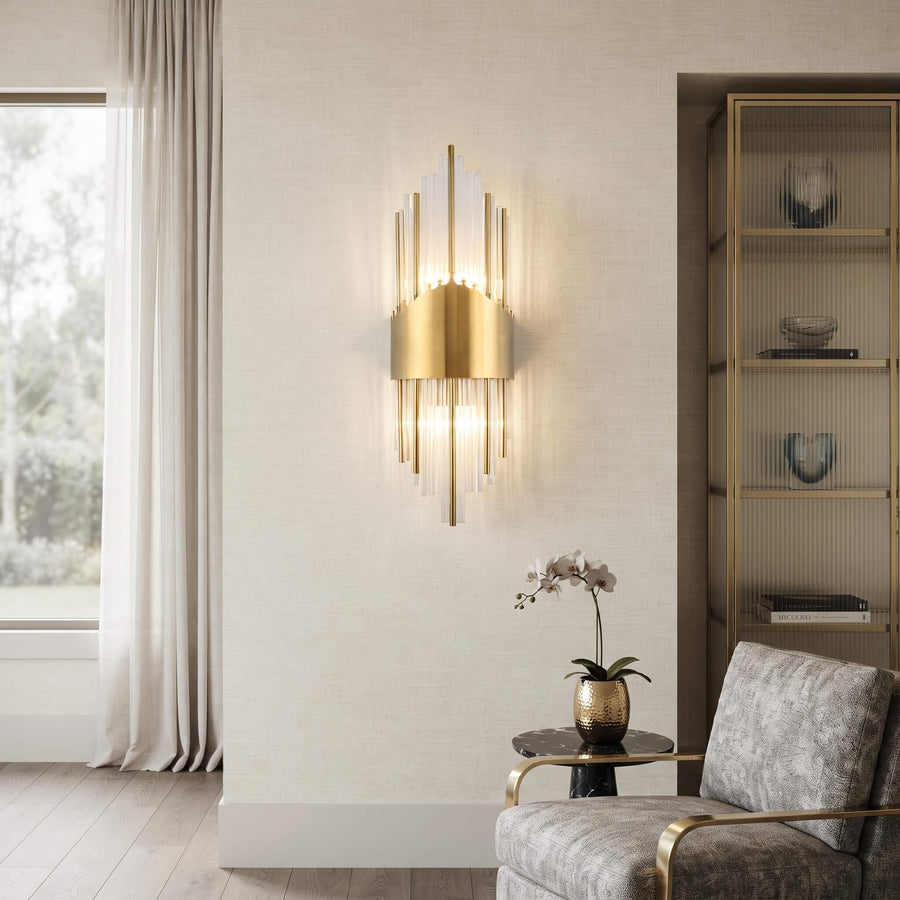Art deco brass and glass wall sconce in a bright living space