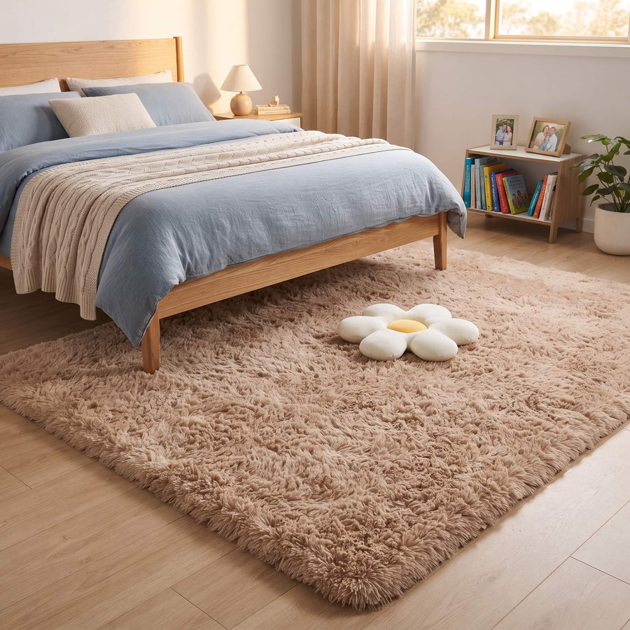 Deep shaggy pile of the plush carpet beneath a bed