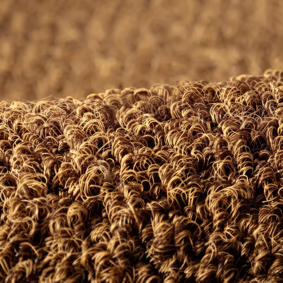 Stiff coir bristles on the welcome mat up close