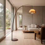 Mid Century Arc Floor Lamp showing the sweep of its black arc and amber dome