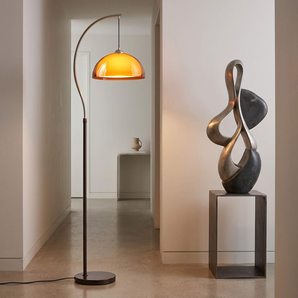 French Mushroom Arc Floor Lamp beside a reading chair