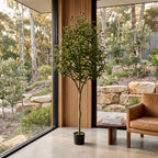 Faux olive tree in an entryway