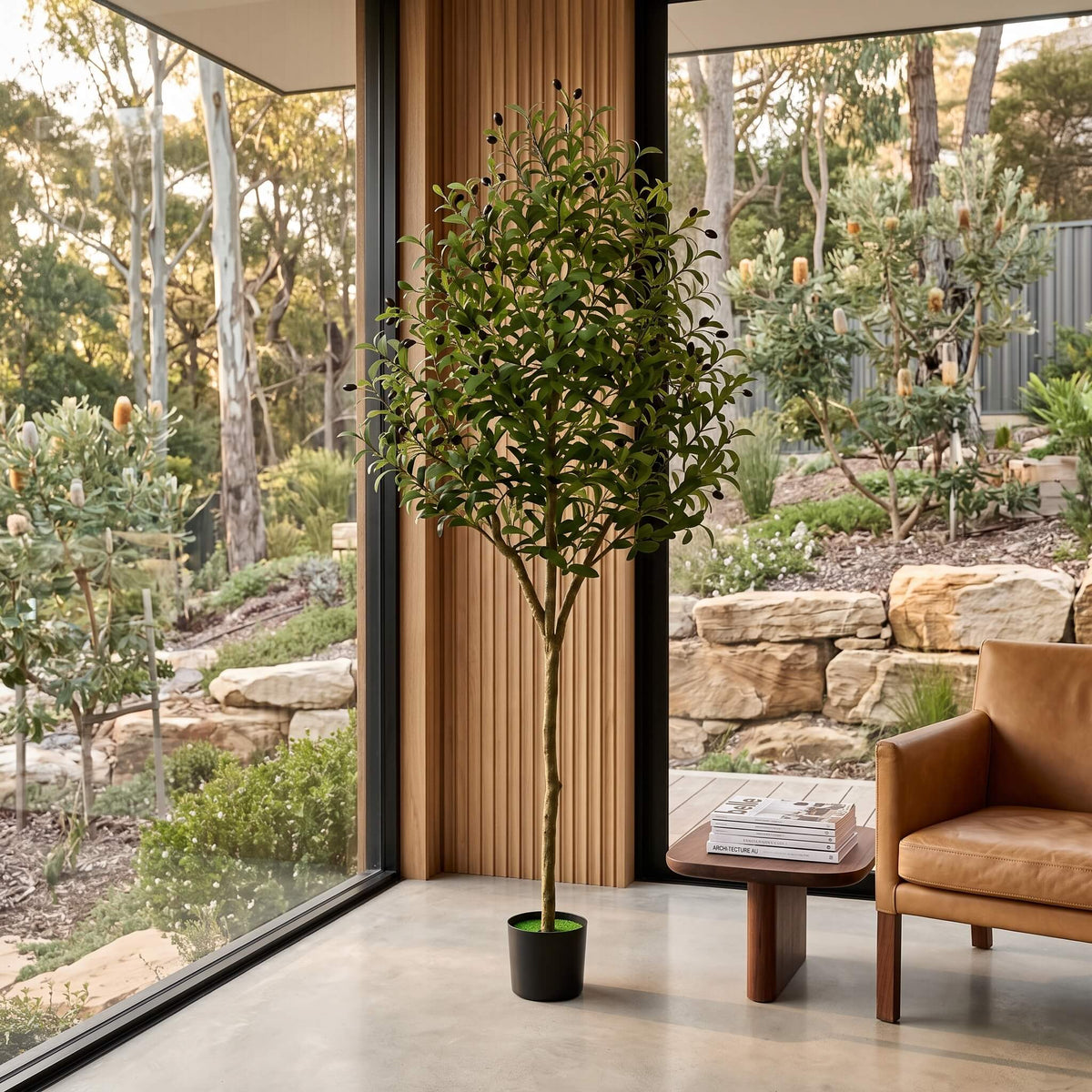 Faux olive tree in an entryway