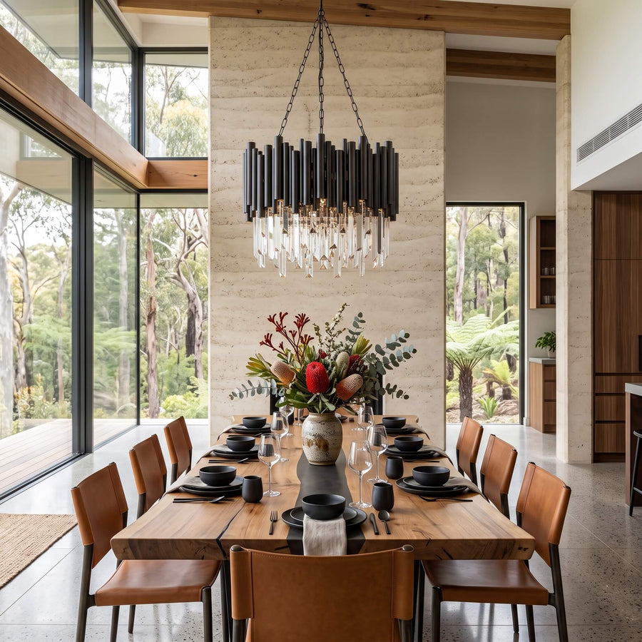 Tiered faceted crystal prisms beneath the black chandelier frame