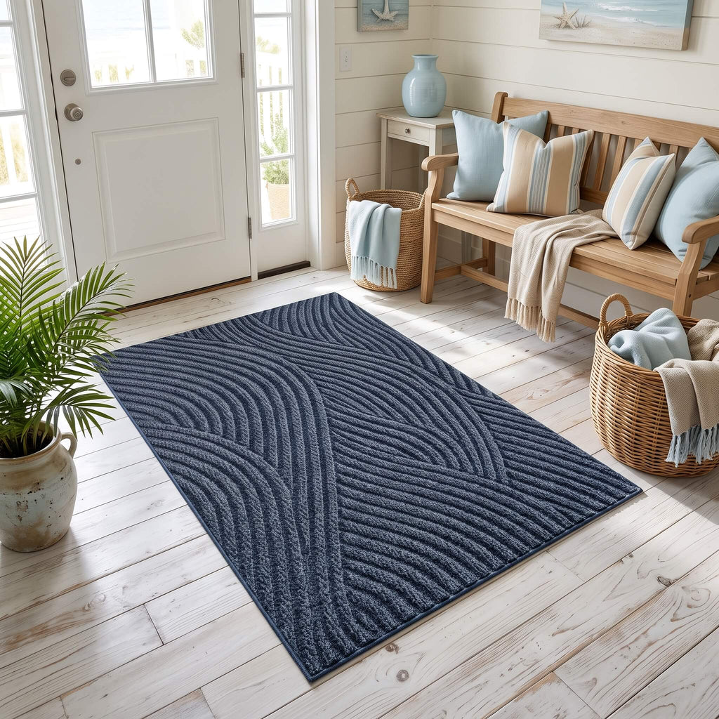 Close view of the arced rib pattern on the blue door mat