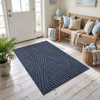Close view of the arced rib pattern on the blue door mat