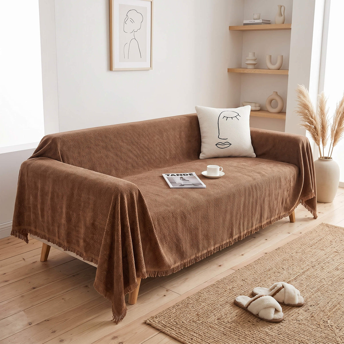 Brown textured sofa cover throw on a couch in a light living room
