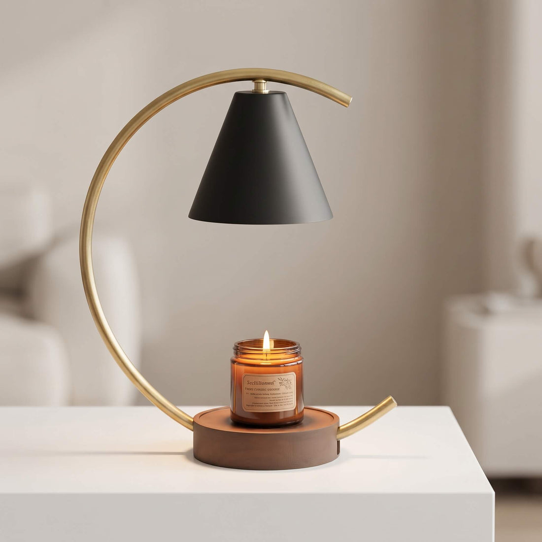 A modern floating candle table lamp with a matte black conical shade, a curved gold metal frame, and a brown wooden base holding a lit amber glass jar candle, displayed on a white table in a softly blurred interior setting.