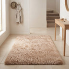 Soft polyester pile of the shaggy carpet in an entryway