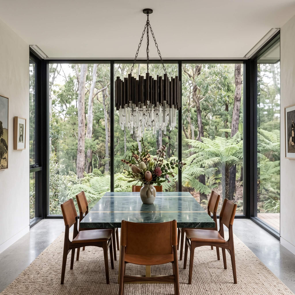 Obsidian crystal chandelier lit in a modern living room