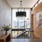 Black crystal chandelier hanging close to the ceiling