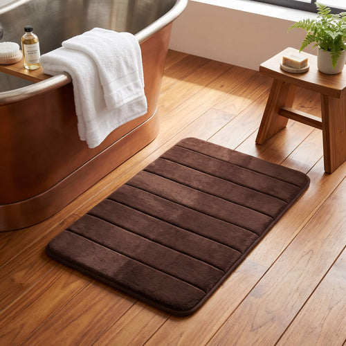 Chocolate brown memory foam bath mat in a bathroom