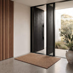 Coir welcome mat in an entryway