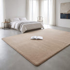 Soft coral fleece surface of the low pile rug in a bedroom
