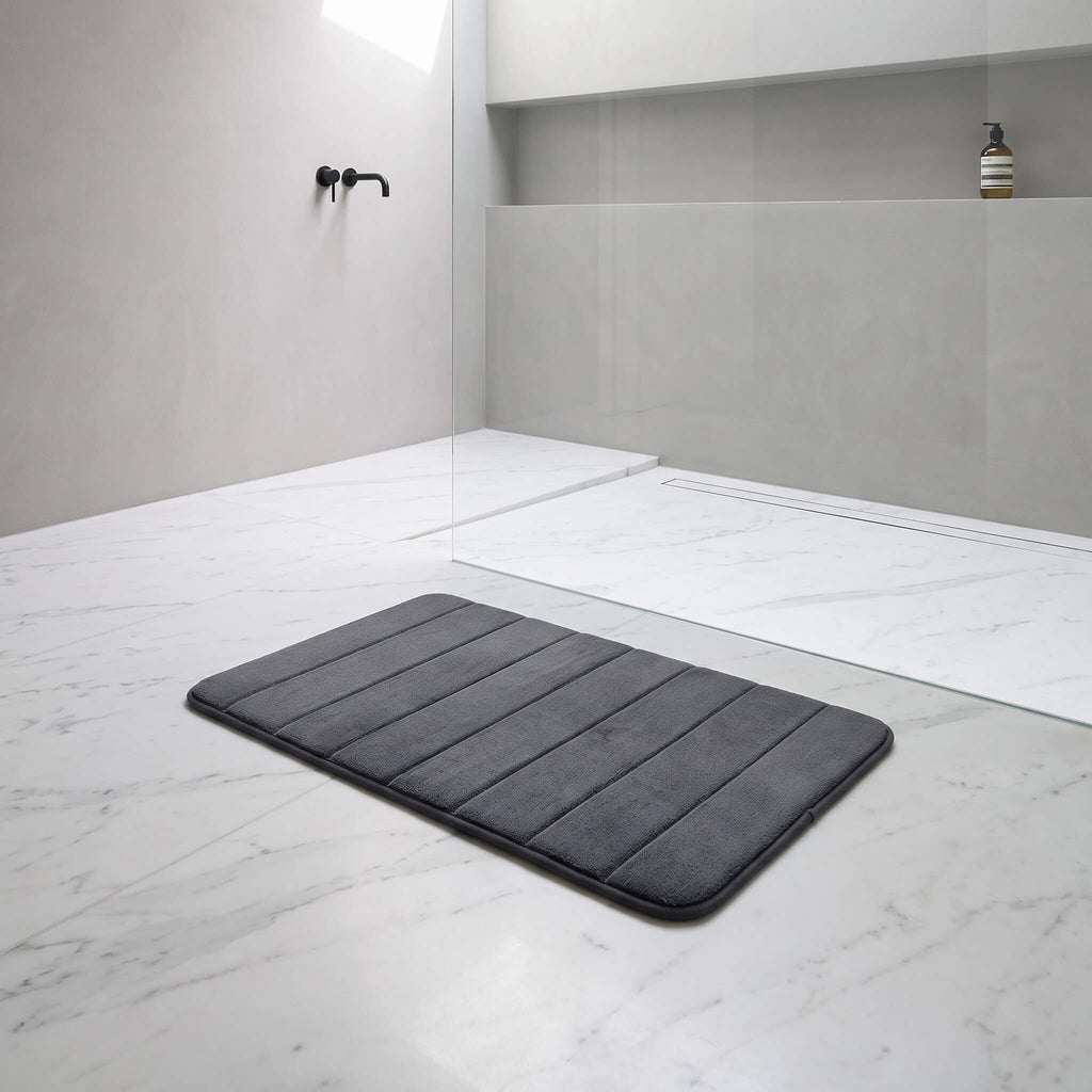 Dark grey memory foam bath mat showing the plush pile