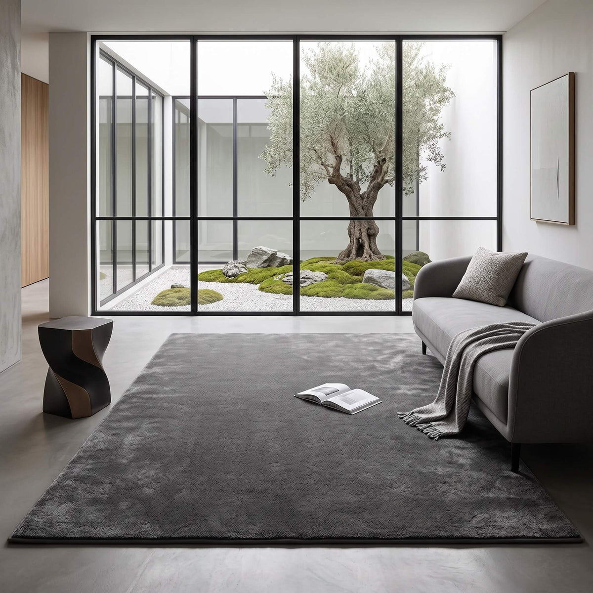 Dark grey coral fleece rug in a lounge room