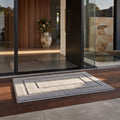 Dirt trapper entry door mat laid at a home entrance