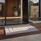 Dirt trapper entry door mat laid at a home entrance