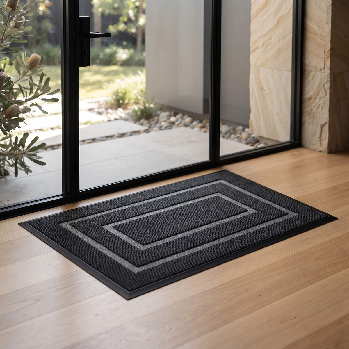 Absorbent microfibre door mat on a timber floor