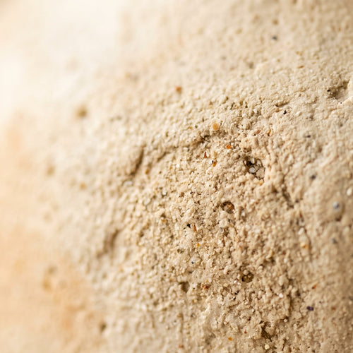 Close-up of vase sandy texture