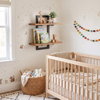 Two tier wall shelf with wood effect boards in a nursery