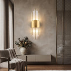 Art deco wall sconce above an entryway console with native flowers