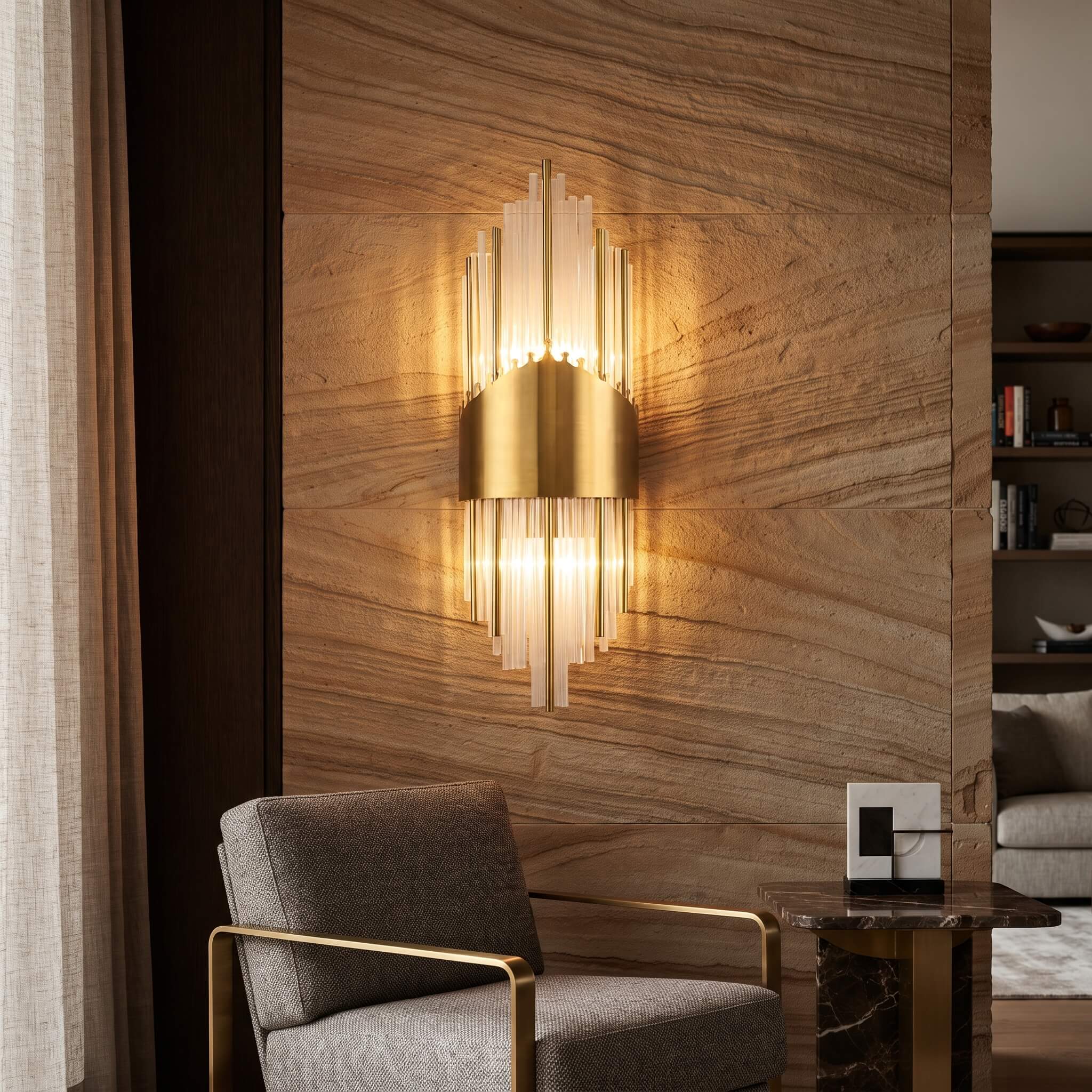Art deco glass rod wall sconce lit against a sandstone feature wall