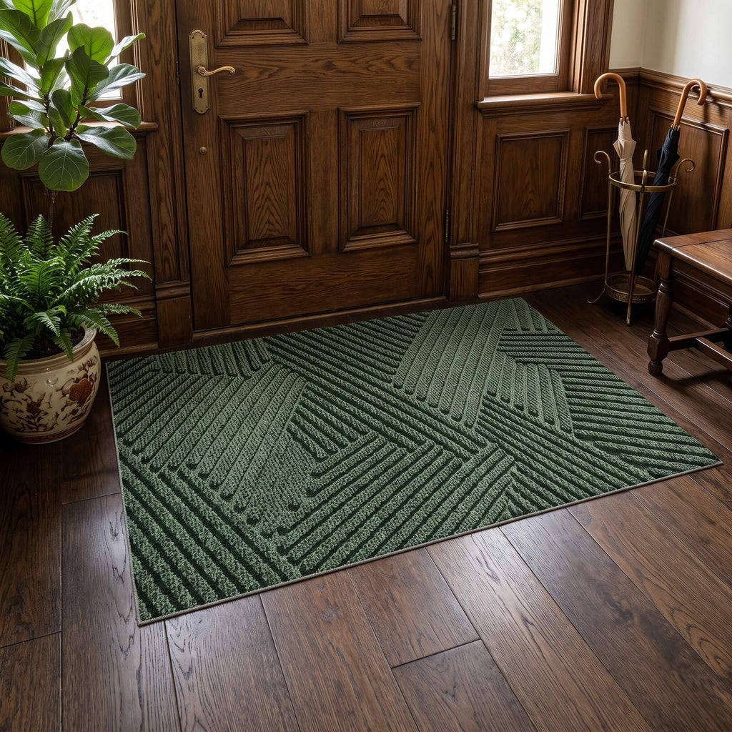 Green door mat showing the woven polypropylene rib texture
