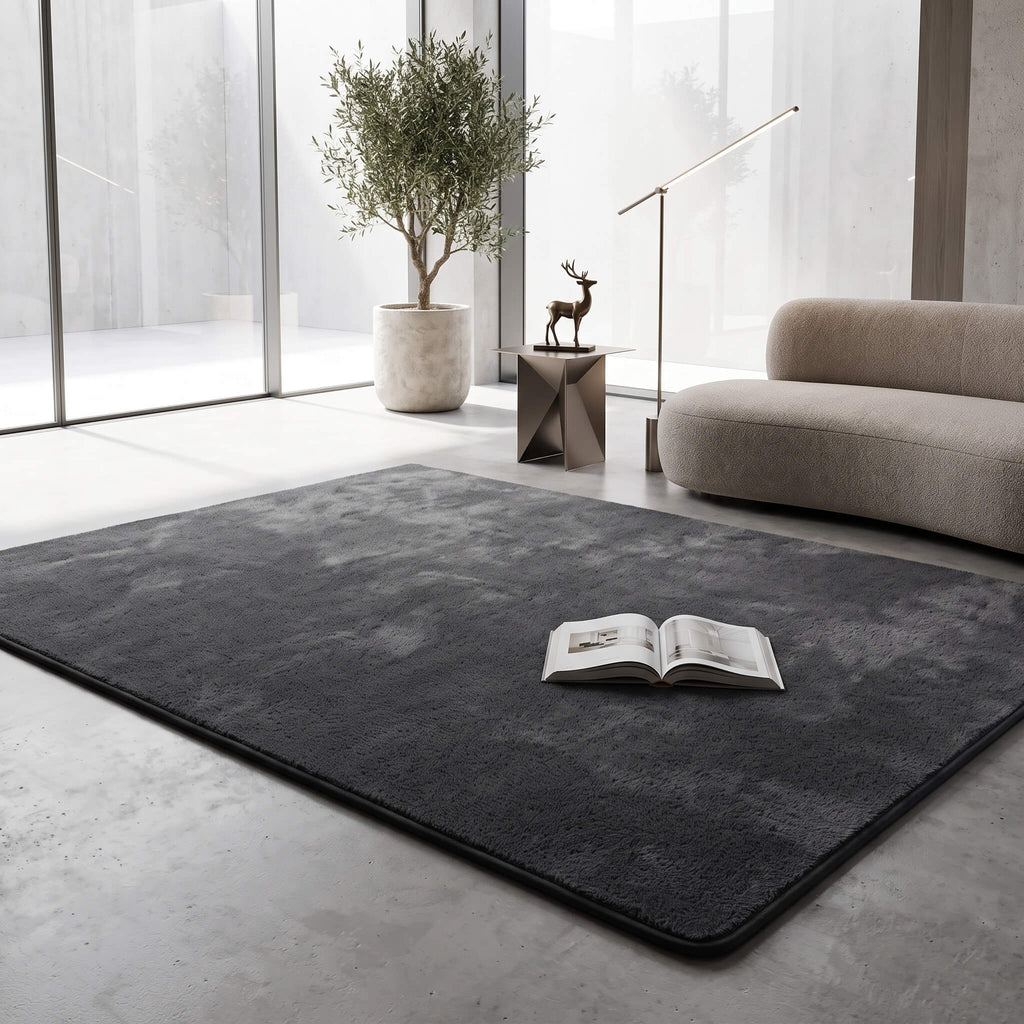 Dark grey coral fleece rug showing its short dense pile
