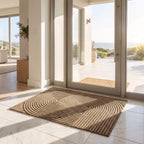 Khaki ribbed door mat lying flat at an open doorway