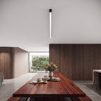 Minimalist linear LED ceiling light mounted flush above a kitchen