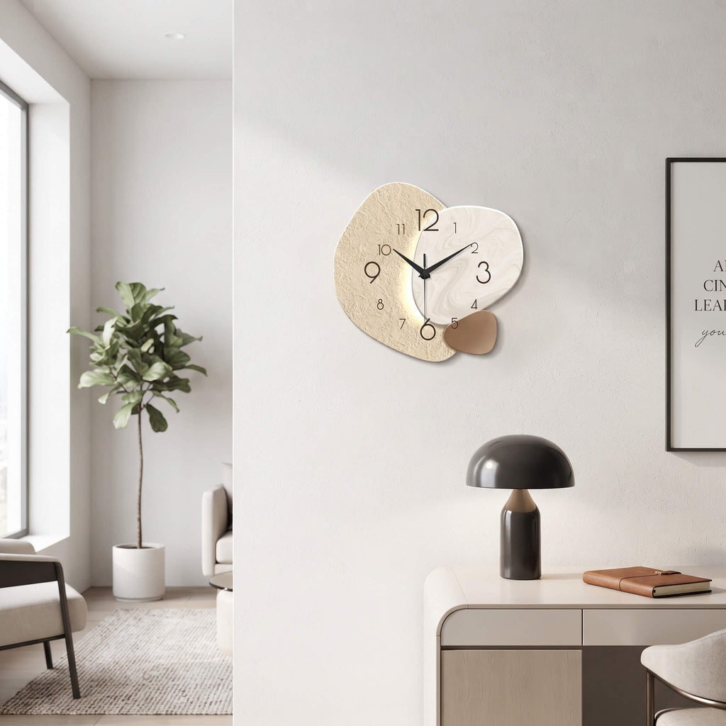 Modern abstract wall clock on a white wall above a sideboard