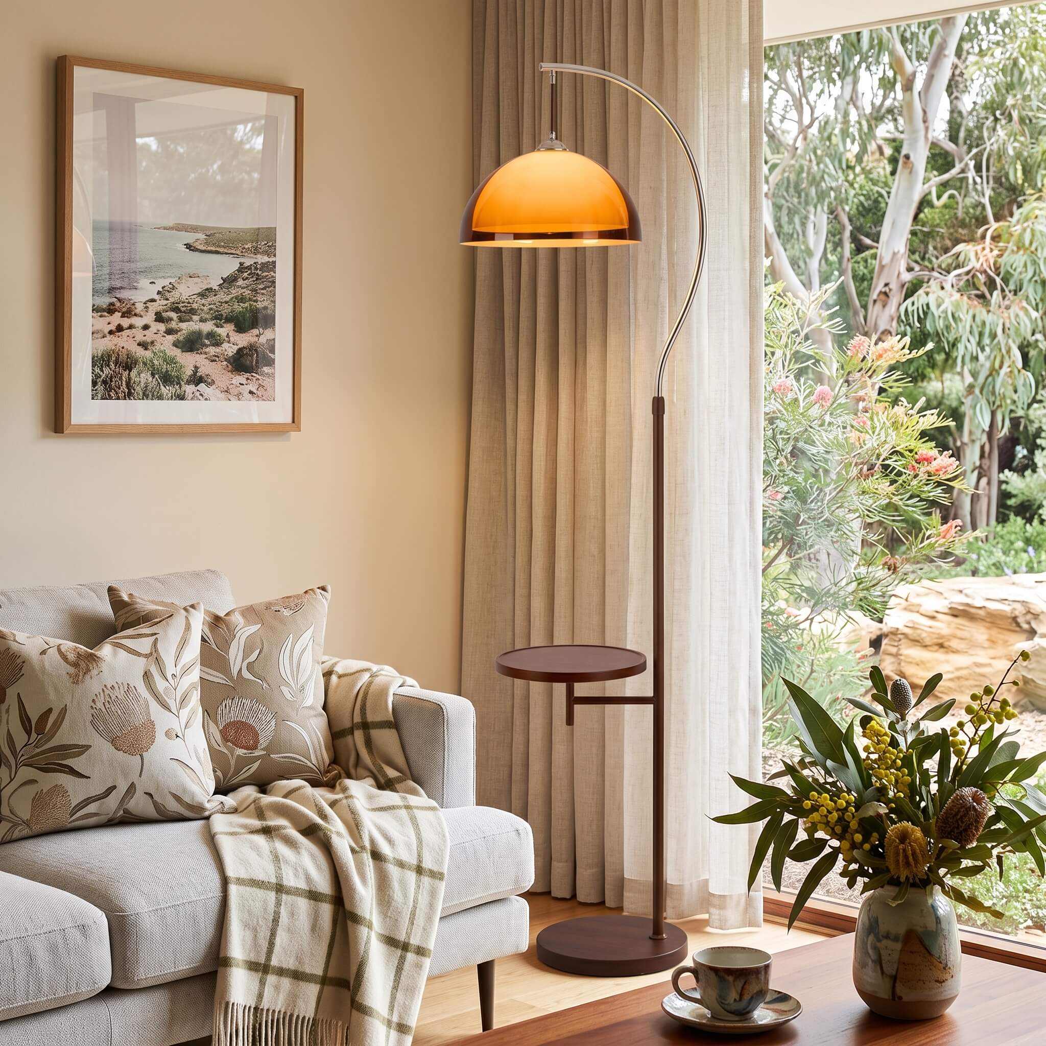 The French Mushroom Arc Floor Lamp glowing warm in a modern living room