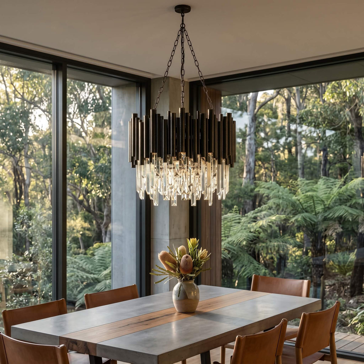 Obsidian crystal chandelier silhouetted against a large window