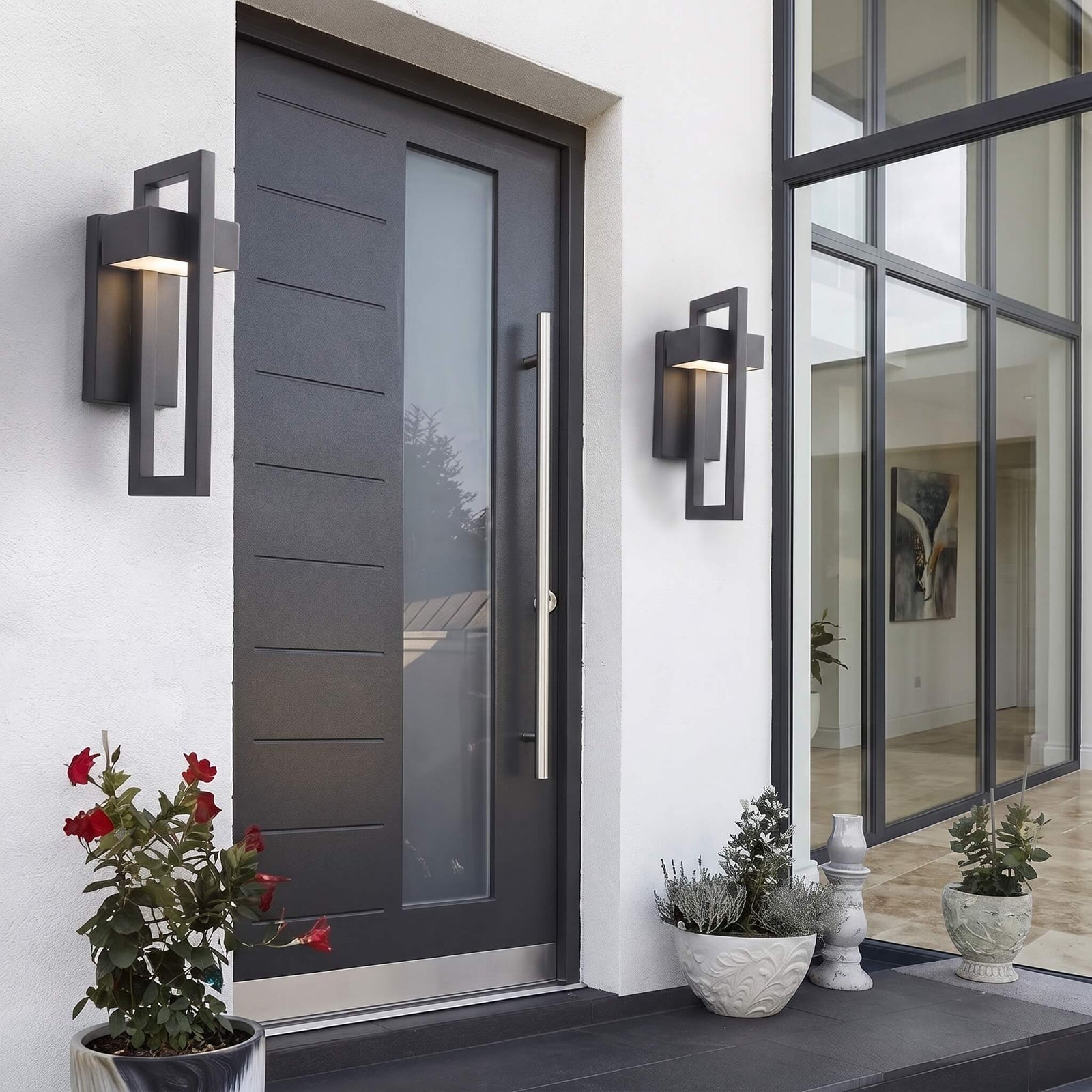 Modern Hollow Outdoor Wall Light in black, geometric hollow frame mounted on an exterior wall