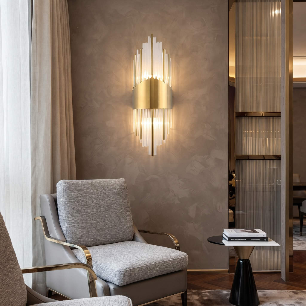 Art deco wall sconce in a living room beside an armchair and side table