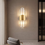 Art deco glass rod wall sconce on a plaster wall above terrazzo flooring