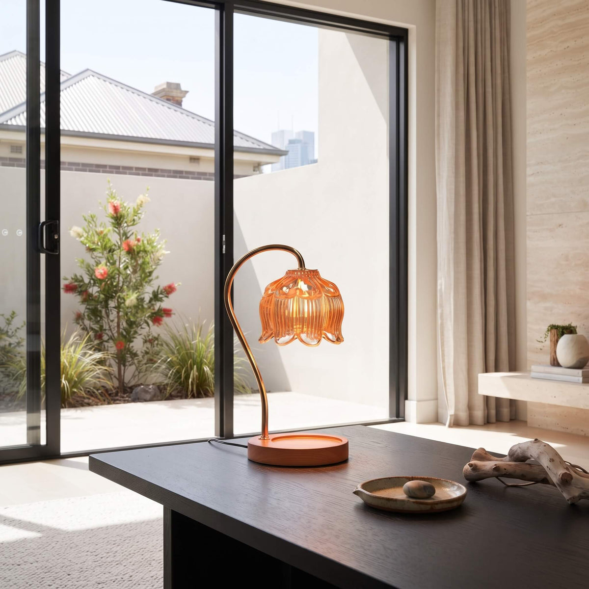 Close view of the fluted amber glass shade on the candle warmer lamp