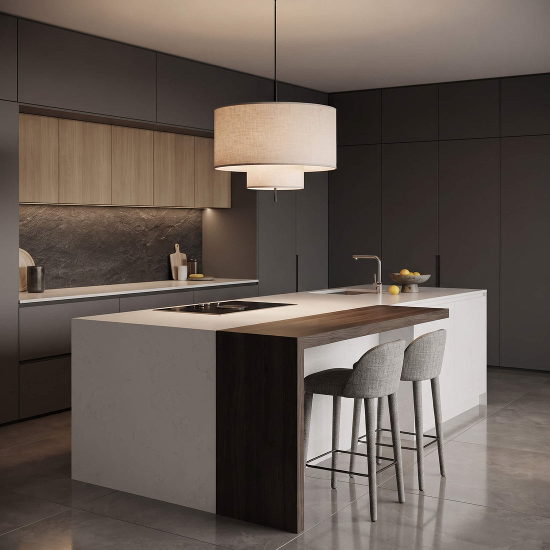 Modern kitchen island with a white countertop, dark wood front panel, and two gray bar stools in a sleek contemporary kitchen.