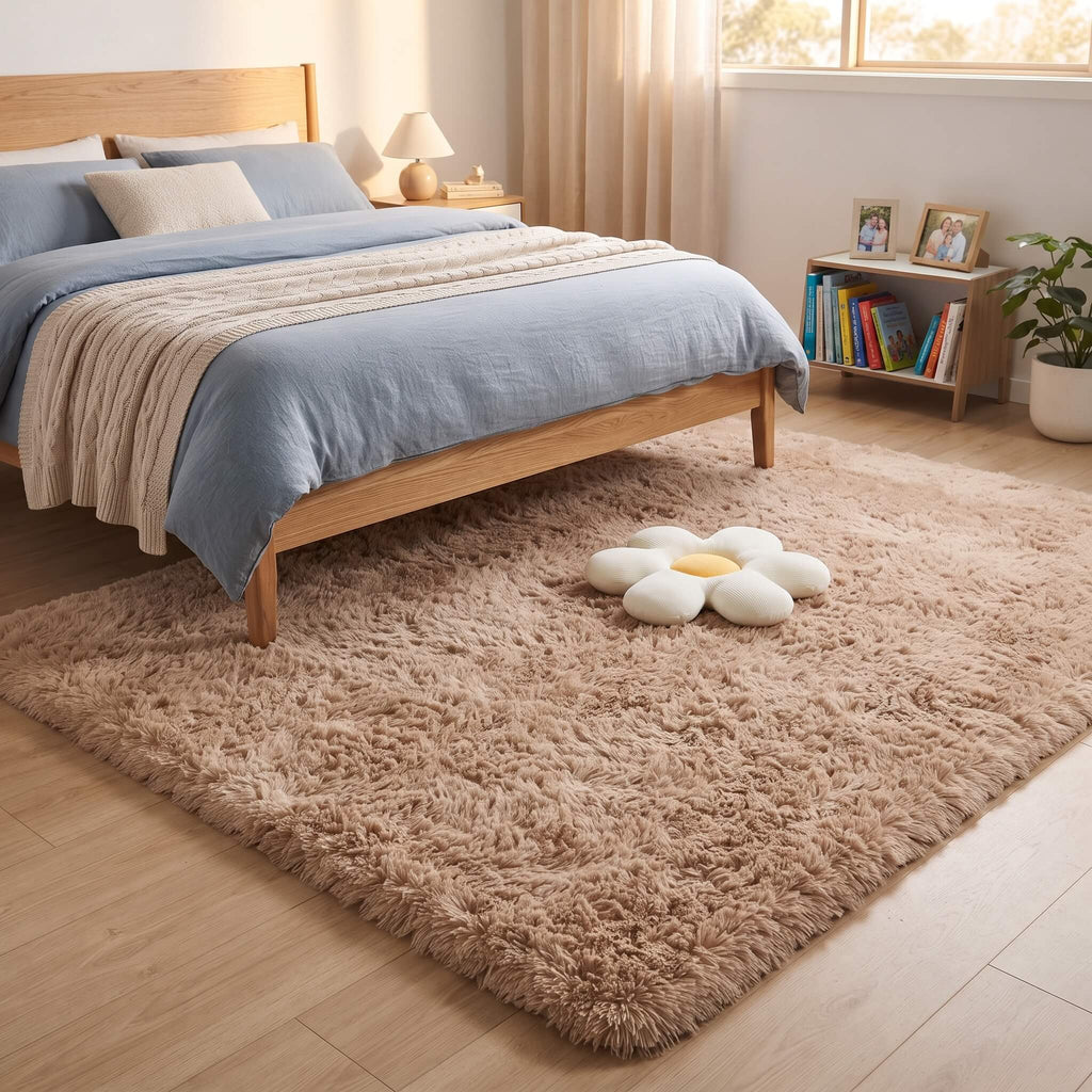 Deep shaggy pile of the plush carpet beneath a bed