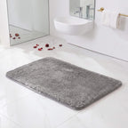 Deep plush pile of the grey bath rug up close
