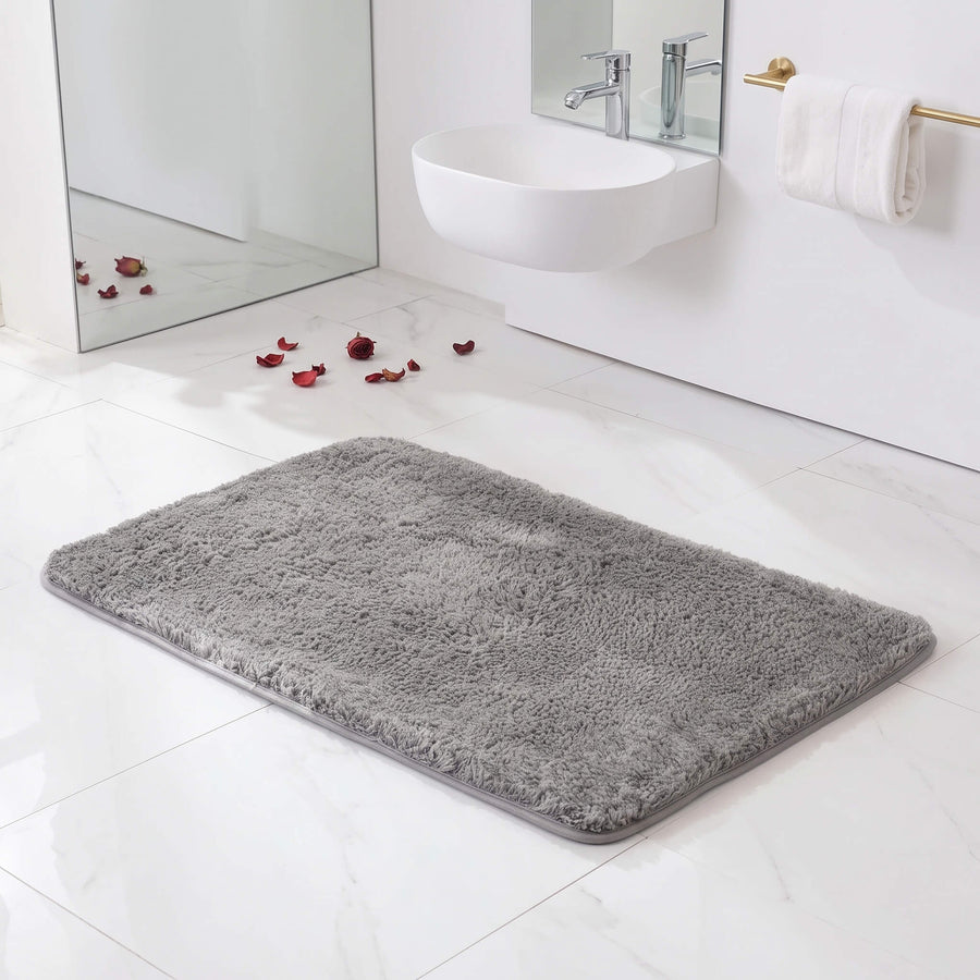 Deep plush pile of the grey bath rug up close