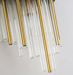 Close view of the clear glass and brass rods on the art deco sconce