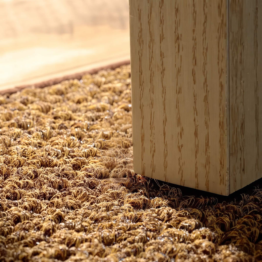 Bound edge detail on the coir welcome mat