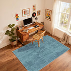 Blue non slip flat pile area rug in a study