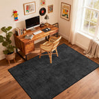 Black non slip flat pile area rug in a home office