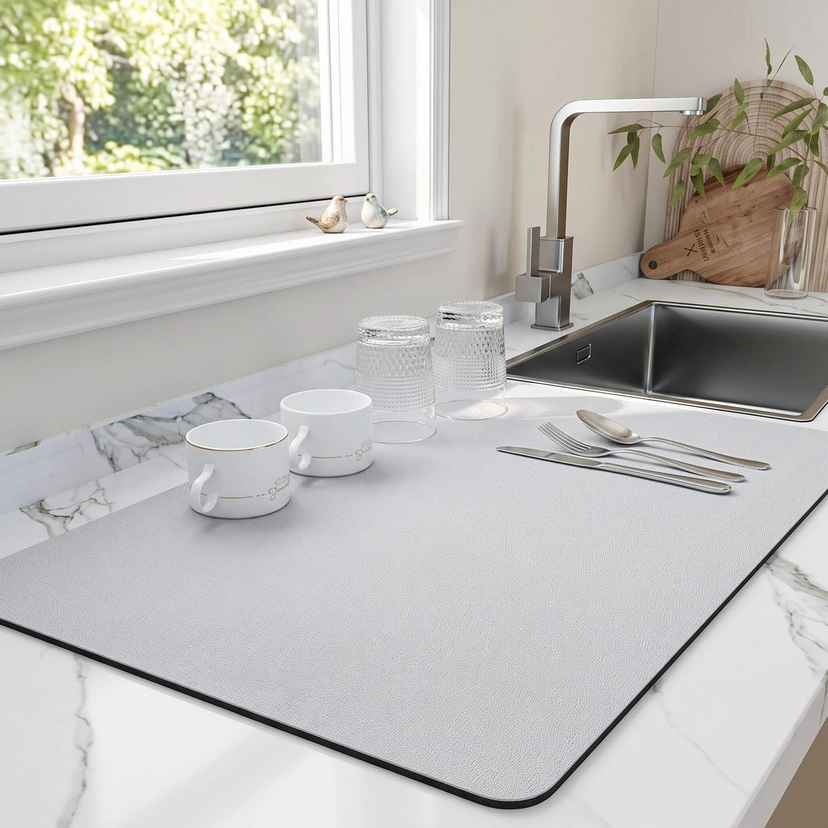 White quick dry dish drying mat holding clean dishes