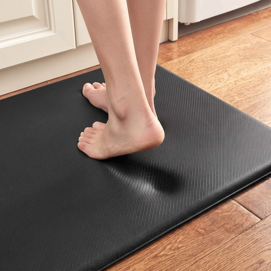 Black anti fatigue kitchen mat showing the cushioned foam core